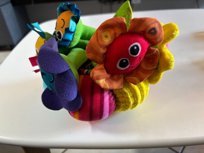 Jardin musical en tissu bouquet fleurs Lamaze