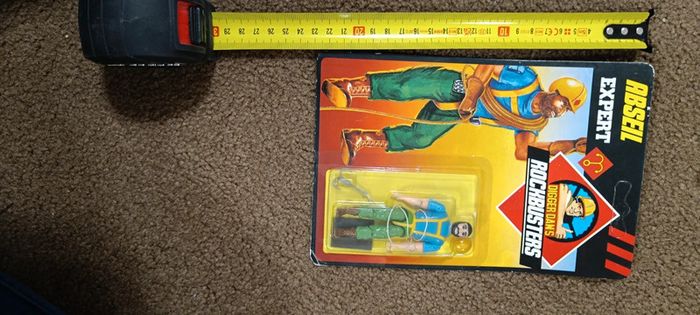 Figurine digger dans sa boîte