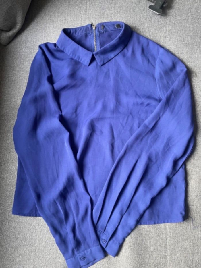 Blouse avec fermeture à l’arrière