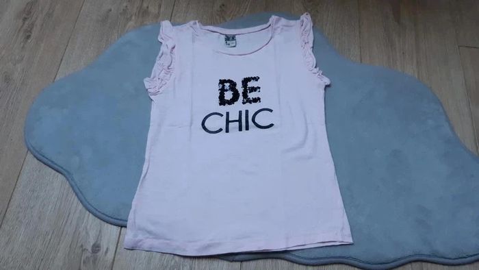 Tee-shirt MC tape à l'oeil rose clair "be chic" 6 ans en très bon état - photo numéro 2