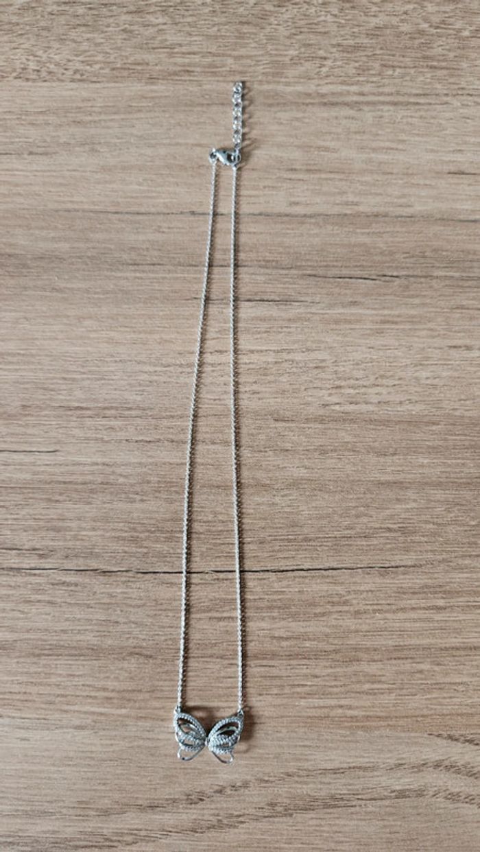 NEUF Collier nœud papillon, argent.
Maty - photo numéro 2