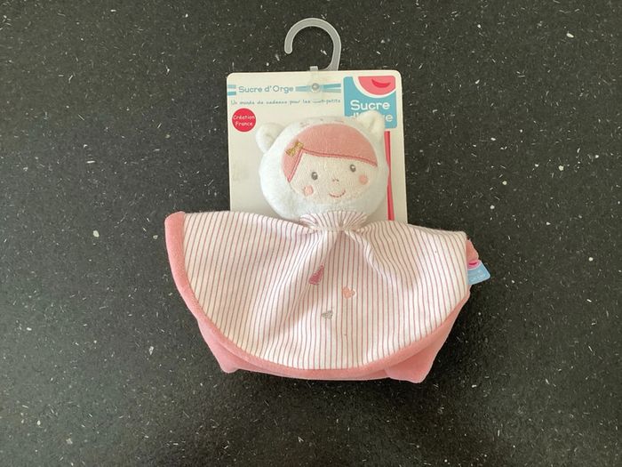 Doudou plat rond rose poupée
