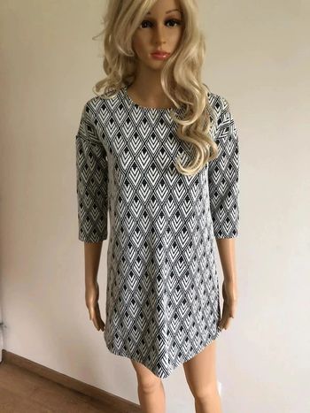 Robe courte noire et blanche pailletée Mango taille S excellent état