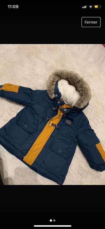 Manteau taille 9 mois en parfait état