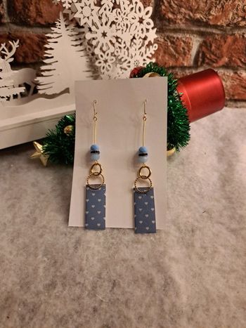 Boucles d'oreilles pendante en résine bleu et doré