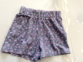 Short T 6 ans La Twisty Compagny bleu mauve avec dessins coquillages
