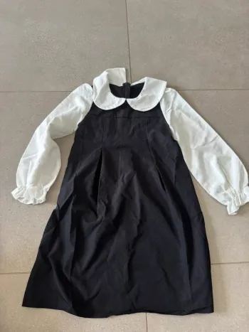 Robe noire et blanche 9 ans, très bon état