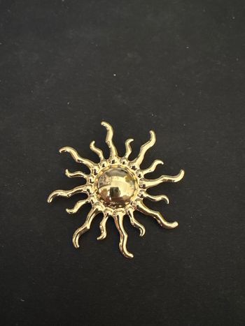 Broche pacotille soleil 