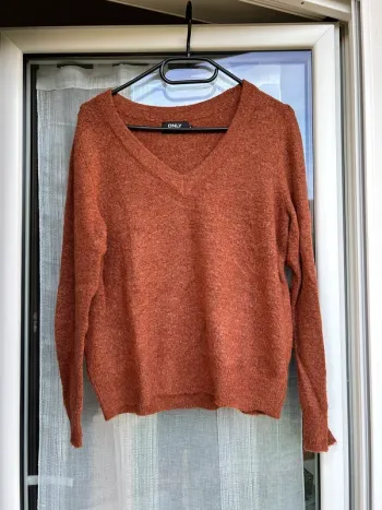 Pull orange rouille