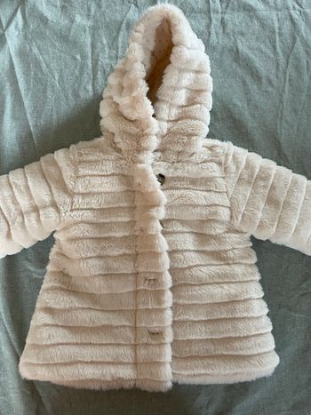 Manteau fourrure élégant beige