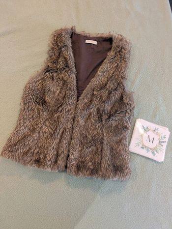 Gilet sans manche fausse fourrure 38