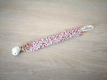 Attache sucette tissu fleur