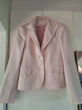 Veste rose clair  taille 42 de belle qualité