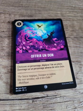 Carte Lorcana " Offrir un don"