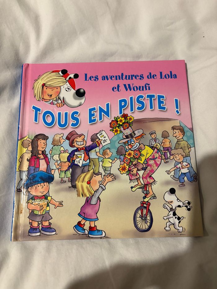 Livre « les aventures de Lola et woufi » tous en piste cirque