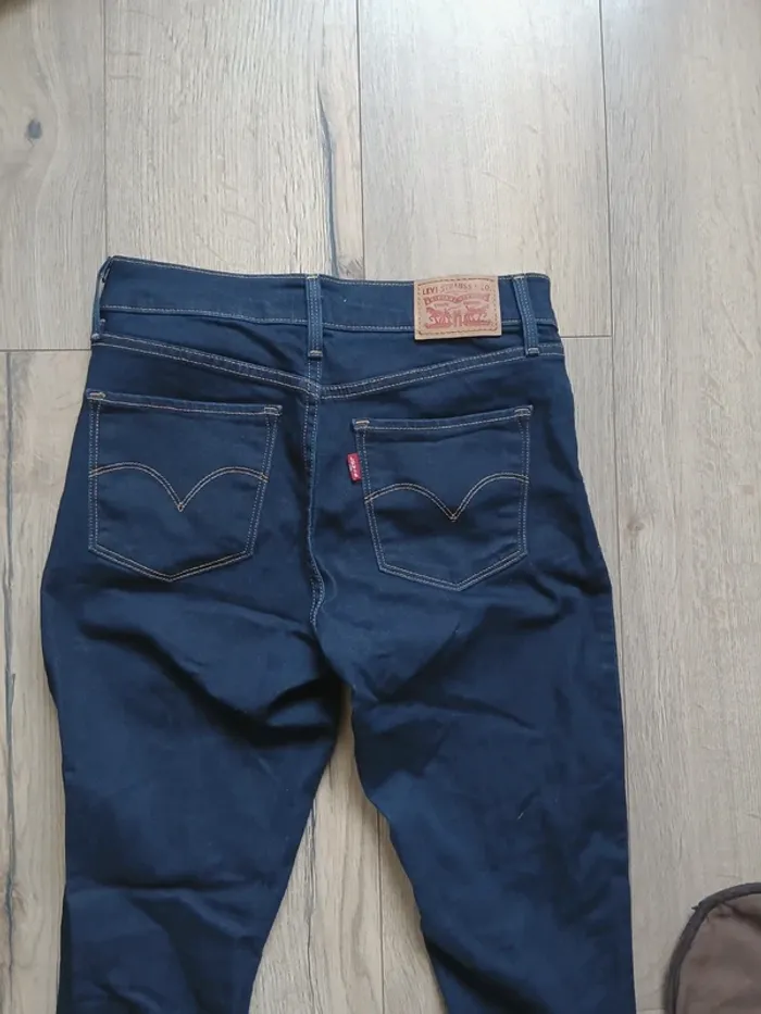 Jean levis 311 skinny 26x30 FR36 bleu brut marine