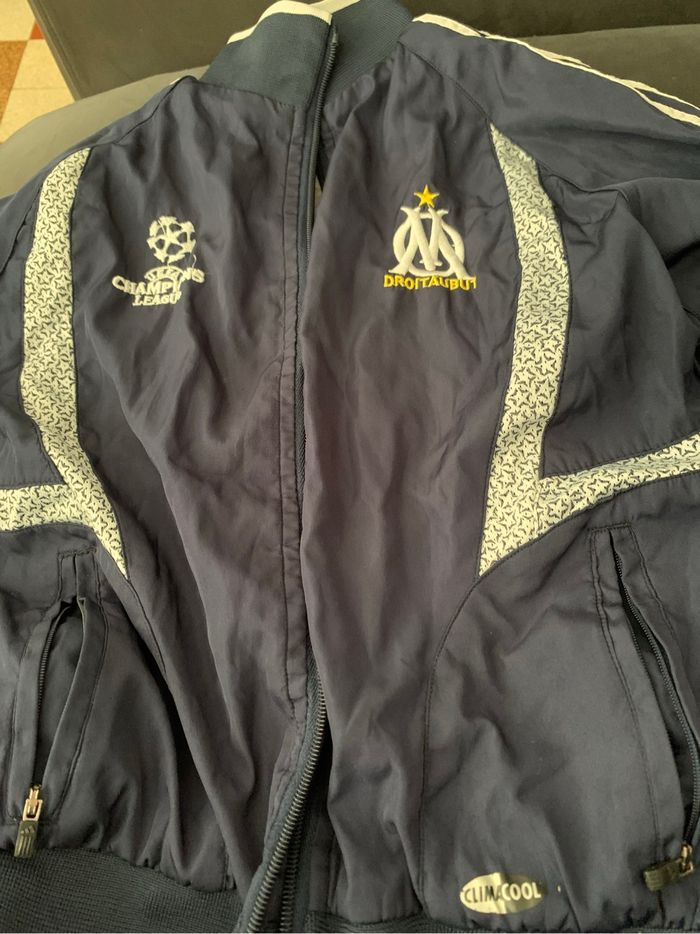 veste OM