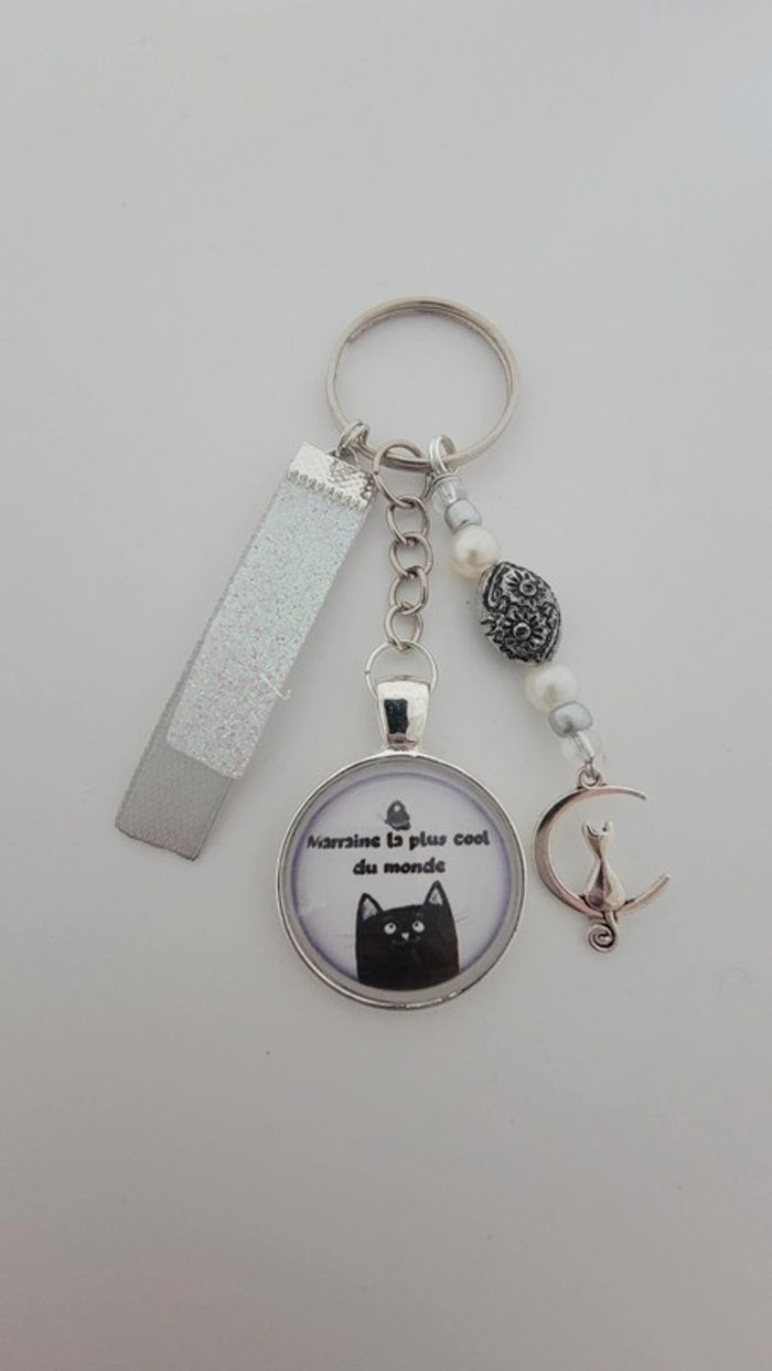 Cadeau marraine, porte clé message bijoux de sac " marraine la plus cool du monde"