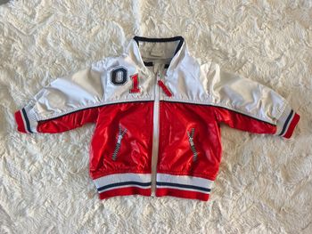 Veste blanche et rouge H&M taille 4/6 mois