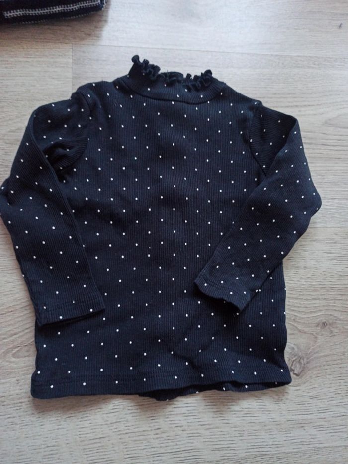 Maillot noir à pois blancs manches longues