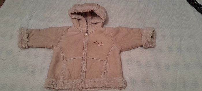 Manteau fausse fourrure