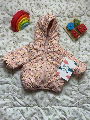 doudoune à capuche réversible 1 coté rose et 1 coté fleuri vertbaudet 6/9 mois