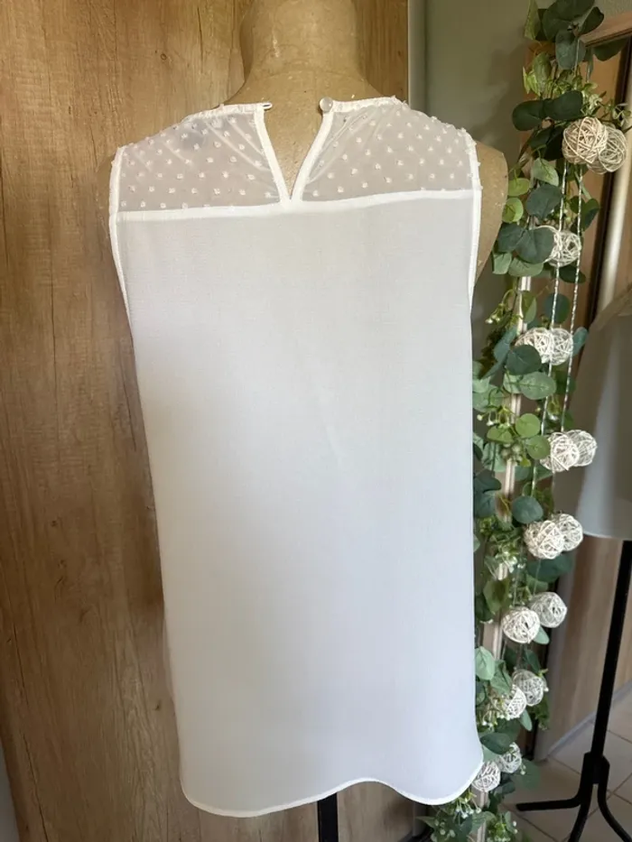 Très jolie blouse sans manches femme - photo numéro 4