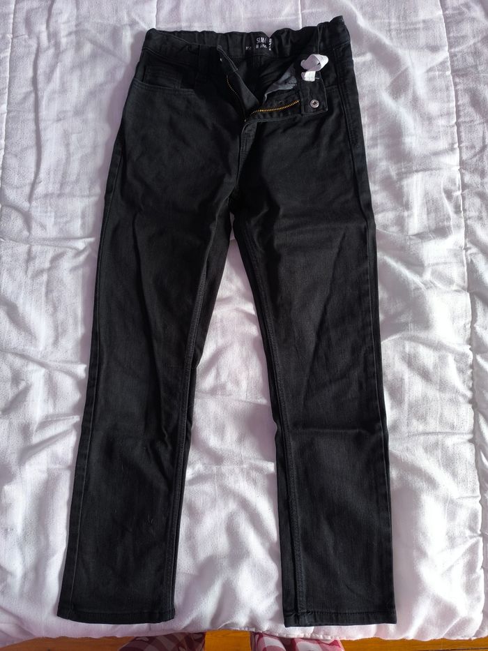 Jean slim noir 8 ans