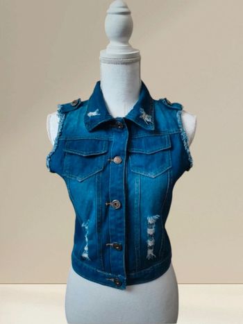 Veste sans manches en jean.