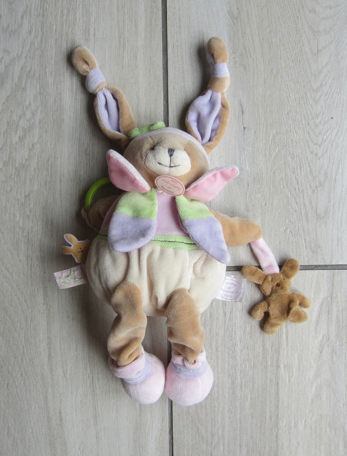 Doudou tout doux avec grelot.