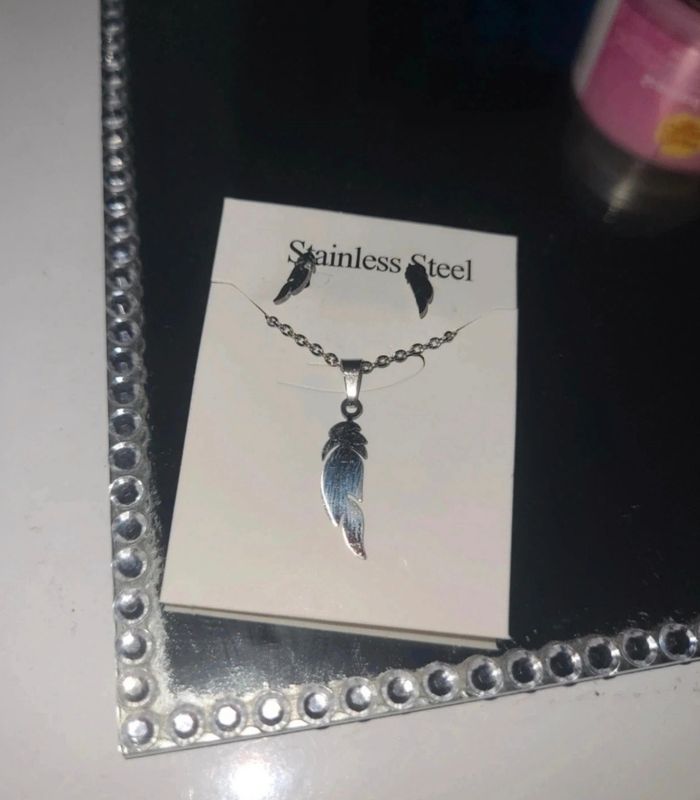 Ensemble en acier inoxydable
argenté plume - photo numéro 3