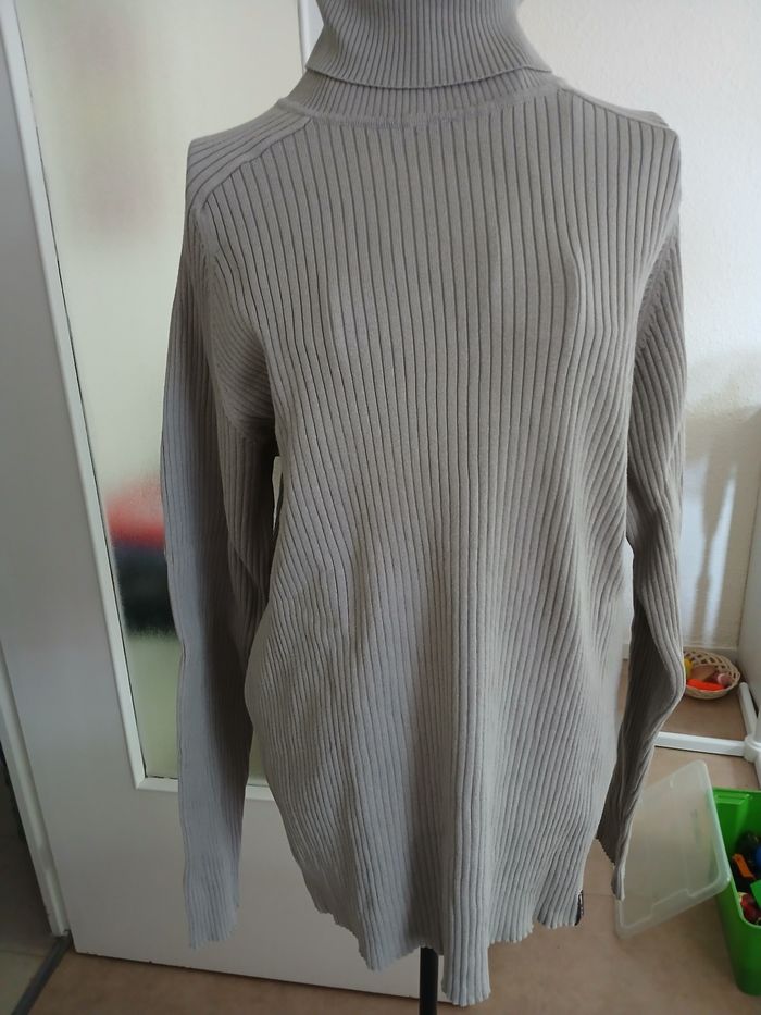 Pull col roulé