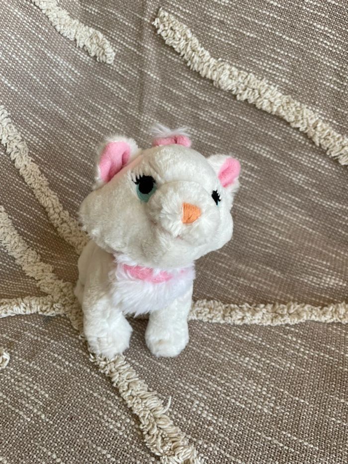 Peluche doudou 22cm Disney les artistochats marie chat blanc noeud rose très bon état
