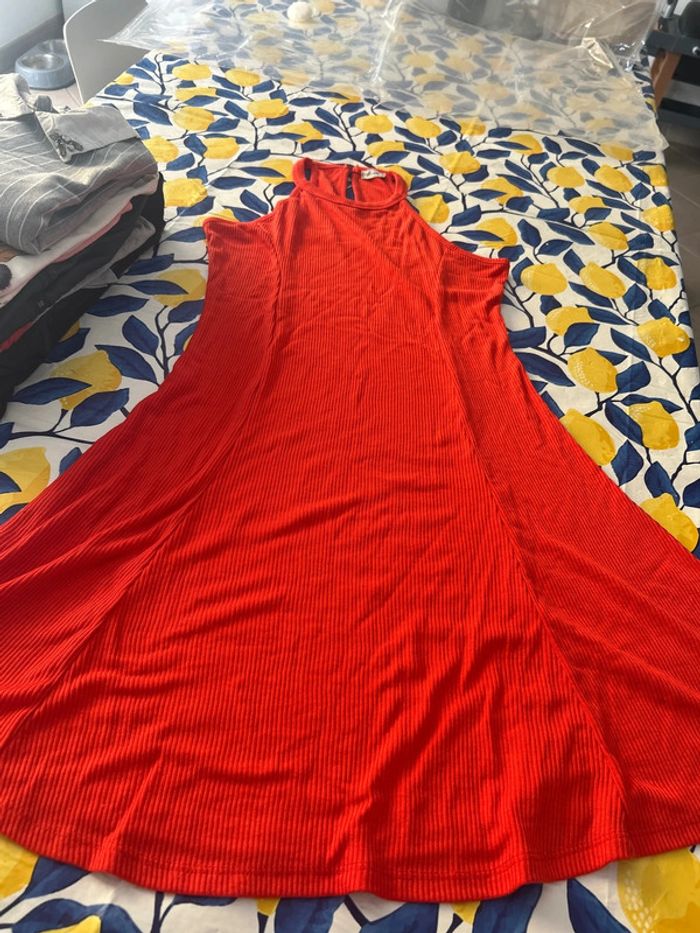Robe rouge patineuse