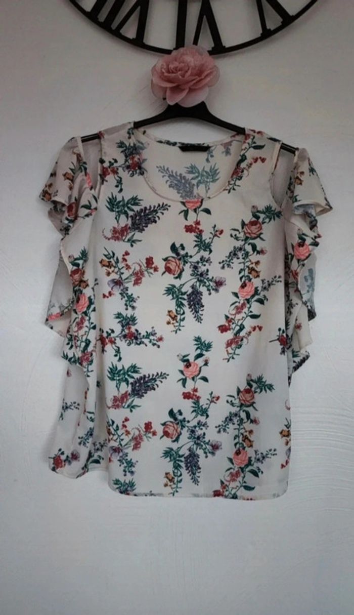 Blouse transparente a fleurs taille xl