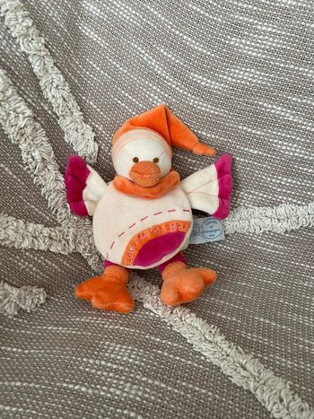 Peluche doudou et compagnie oiseau orange et rose très bon état