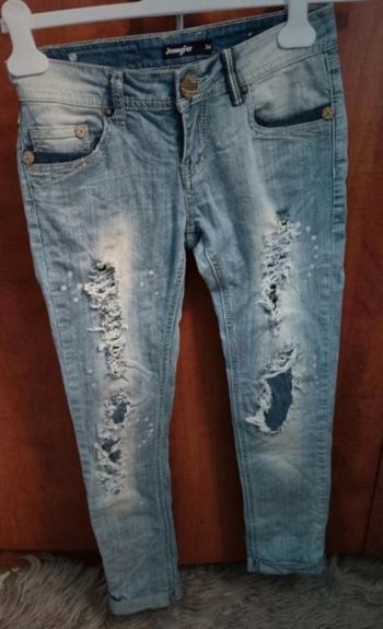 Jeans effet délavé avec troués taille 34