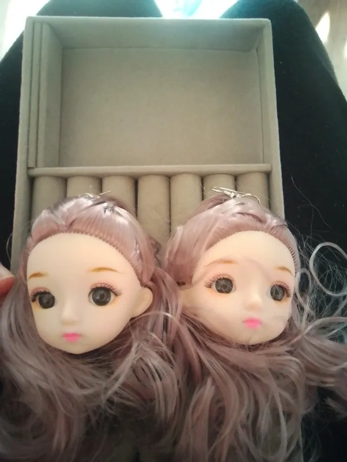 Boucles d'oreilles têtes de poupées