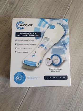 Aspirateur à poux et lentes V-Comb