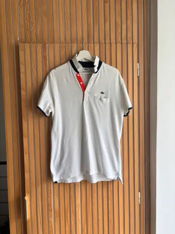 Polo Lacoste blanc