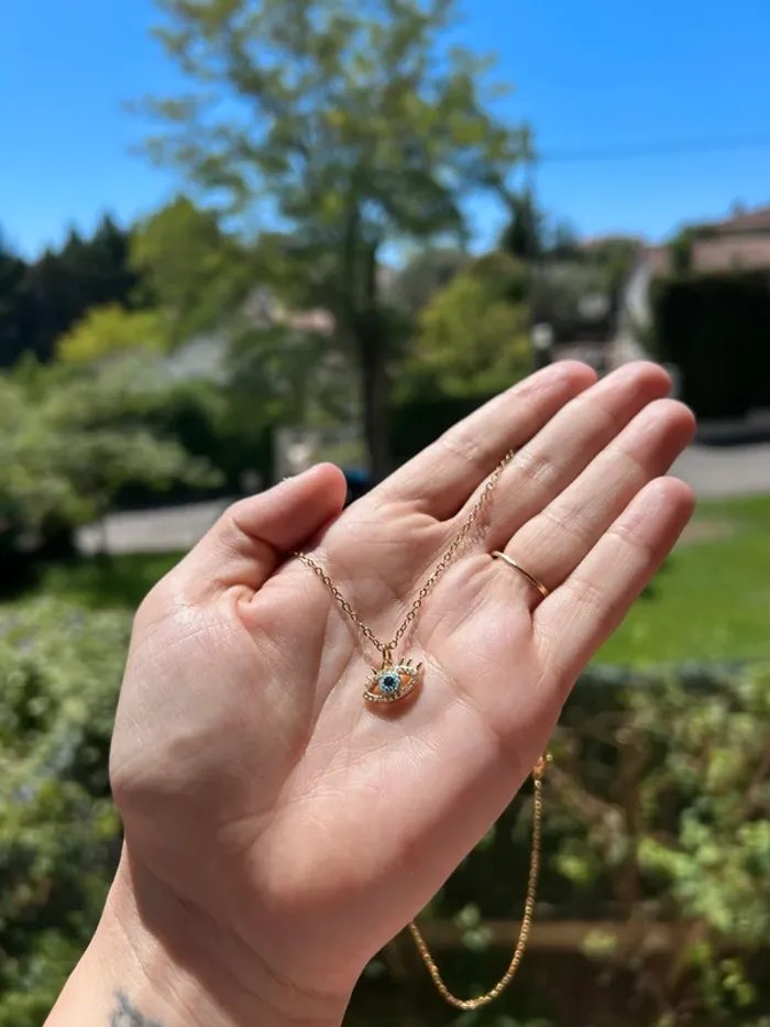 Collier œil protecteur en acier inoxydable plaqué or 18k et zircons - photo numéro 4