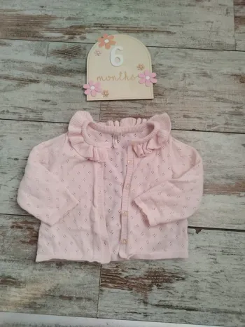 Gilet rose pâle