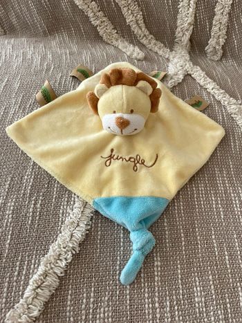 Peluche doudou Plat 22cm carrefour nicotoy lion jaune marron et bleu jungle bon état