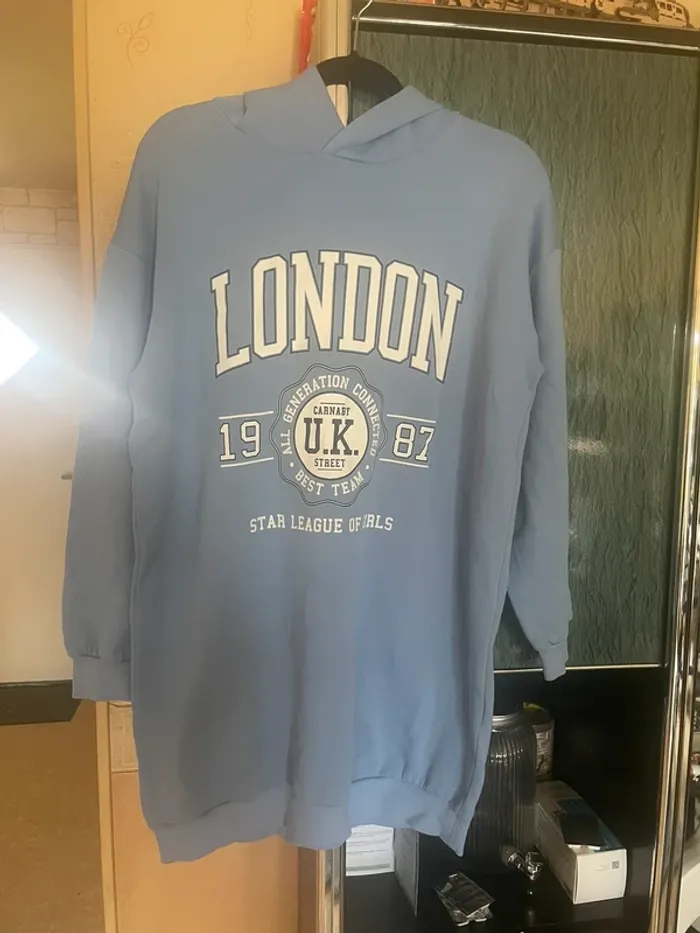 Long pull bleu clair