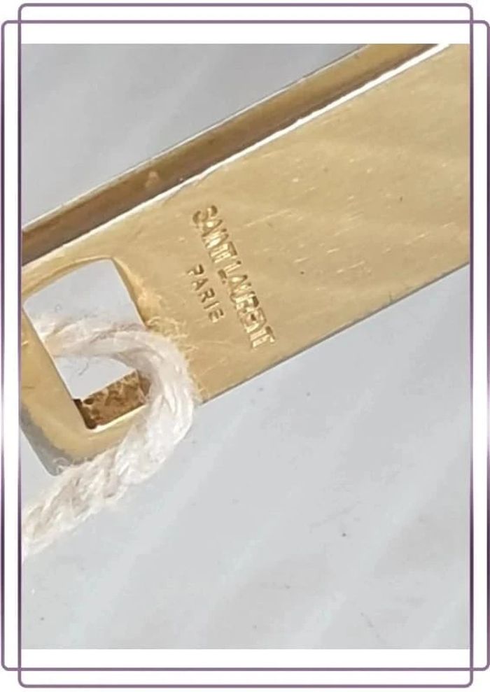 Portefeuille Saint Laurent vintage en cuir, bon état mais quelques  traces d'usures, 20x10cm - photo numéro 8