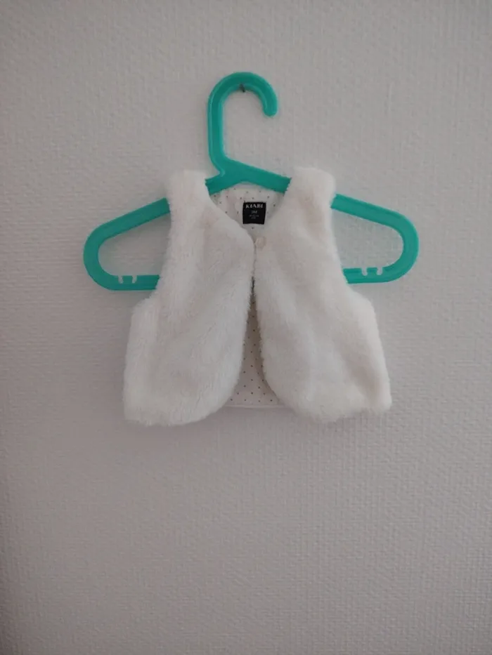 Gilet sans manches taille 3 mois neuf