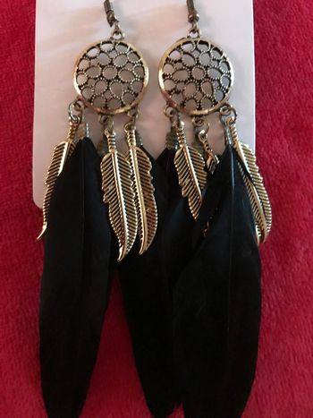 Boucle d'oreilles à grands plumes