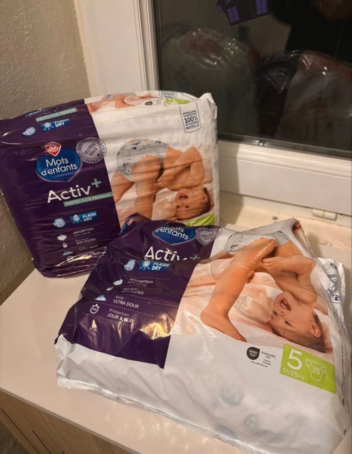 Couches activ+ - 50 couches - mots d’enfants - taille 5 - 11 à 25 kg - un neuf et un entamé