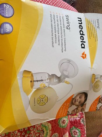 Tire lait medela swing