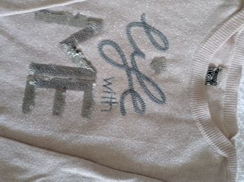 Pull fille tape à l'oeil